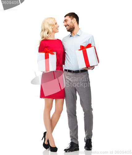 Image of happy couple with gift boxes