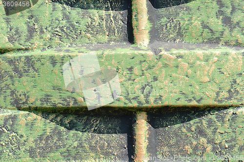 Image of Old rusty green corrugated metal wall