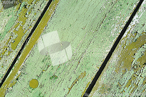 Image of Surface of an empty green wooden background.