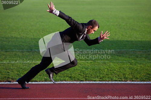 Image of business man ready to sprint