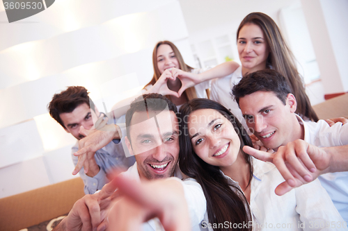 Image of group of friends taking selfie