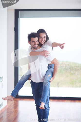 Image of happy young romantic couple have fun and  relax at home