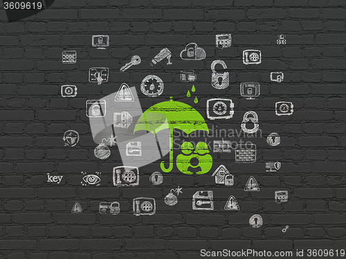 Image of Security concept: Family And Umbrella on wall background