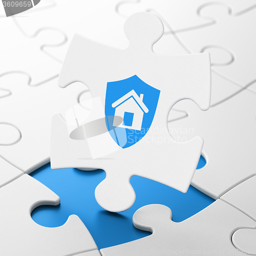Image of Finance concept: Shield on puzzle background