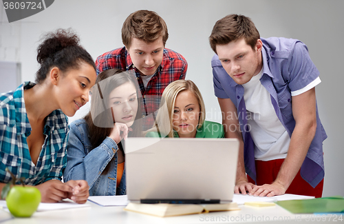 Image of group of high school students with laptop