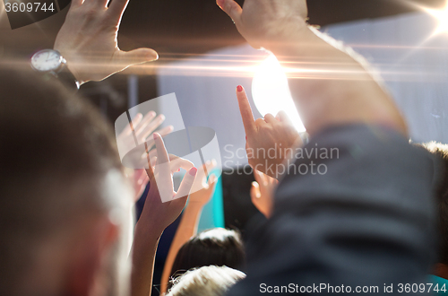 Image of close up of happy people at concert in night club