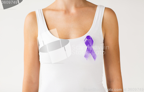 Image of close up of woman with purple awareness ribbon