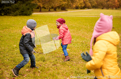Image of group of happy little kids running outdoors