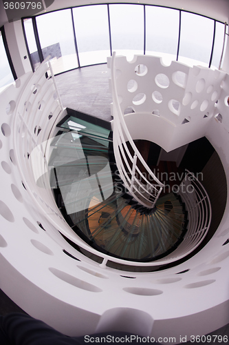 Image of modern glass spiral staircase