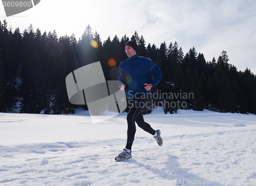 Image of jogging on snow in forest