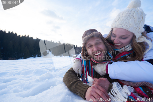 Image of romantic young couple on winter vacation