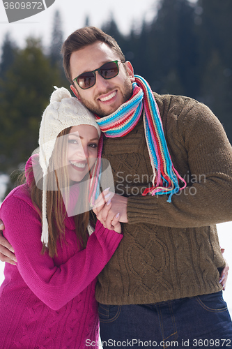 Image of romantic young couple on winter vacation