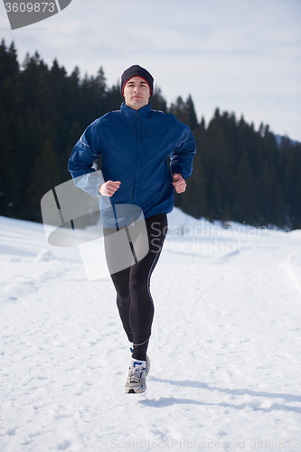 Image of jogging on snow in forest