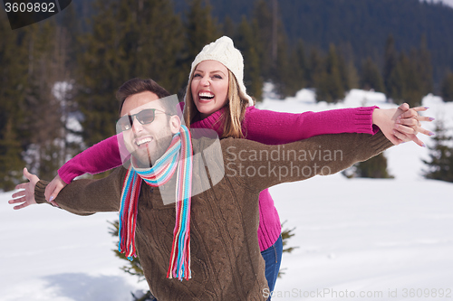 Image of romantic young couple on winter vacation