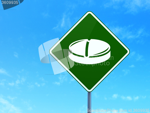 Image of Healthcare concept: Pill on road sign background