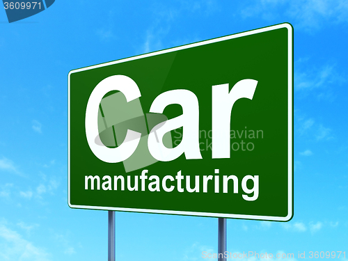 Image of Manufacuring concept: Car Manufacturing on road sign background