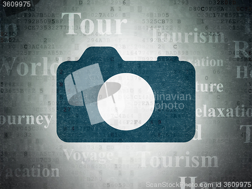 Image of Vacation concept: Photo Camera on Digital Paper background