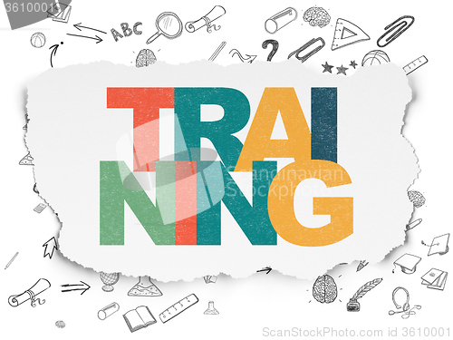 Image of Learning concept: Training on Torn Paper background