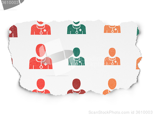 Image of Medicine concept: Doctor icons on Torn Paper background