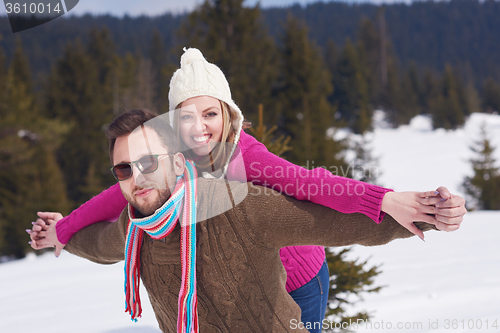 Image of romantic young couple on winter vacation