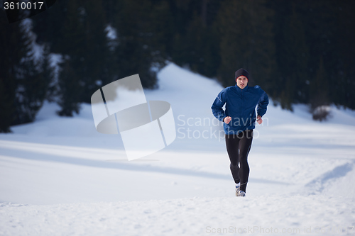 Image of jogging on snow in forest