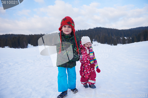 Image of kids walking on snow