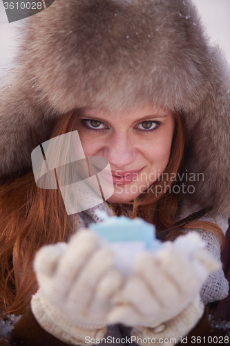 Image of winter girl with gift