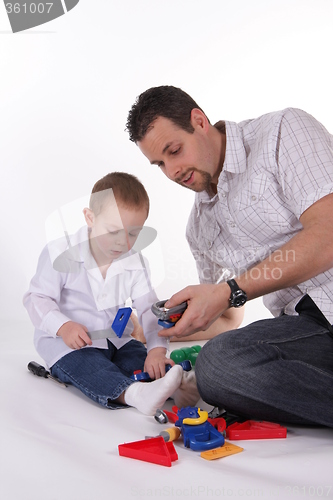 Image of Father playing with his son