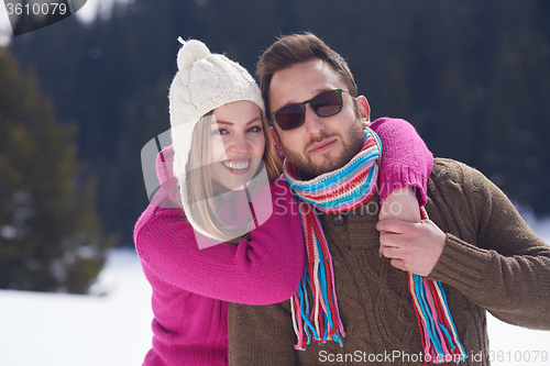 Image of romantic young couple on winter vacation