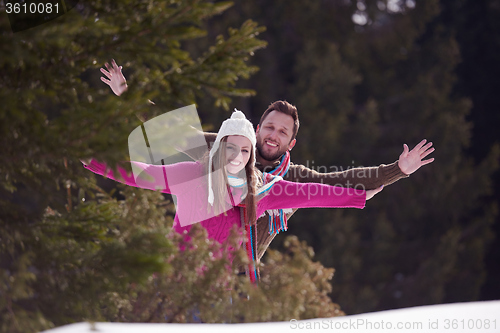 Image of romantic young couple on winter vacation