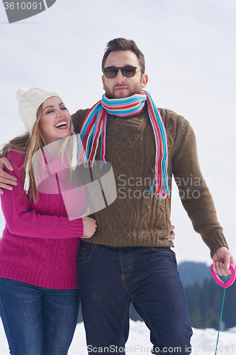 Image of romantic young couple on winter vacation