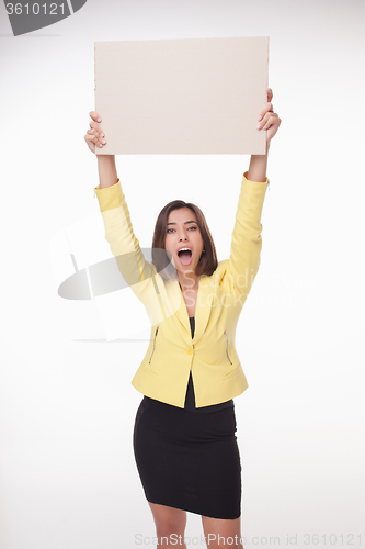 Image of Businesswoman showing board or banner with copy space on white background 