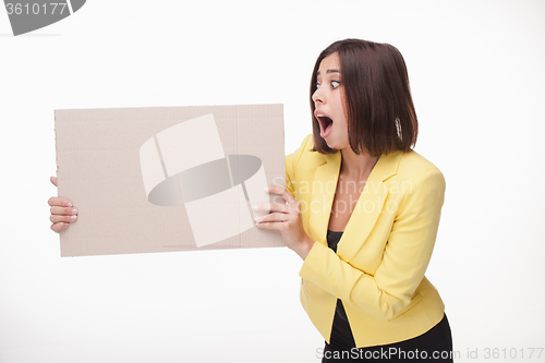 Image of Businesswoman showing board or banner with copy space on white background 