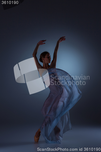 Image of The beautiful ballerina dancing with blue veil
