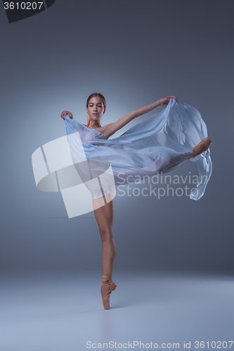 Image of The beautiful ballerina dancing with blue veil