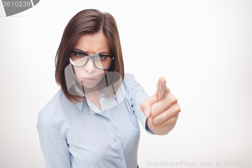 Image of young business woman showing on the white background