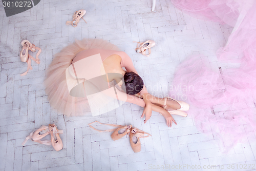 Image of Professional ballet dancer resting after the performance.