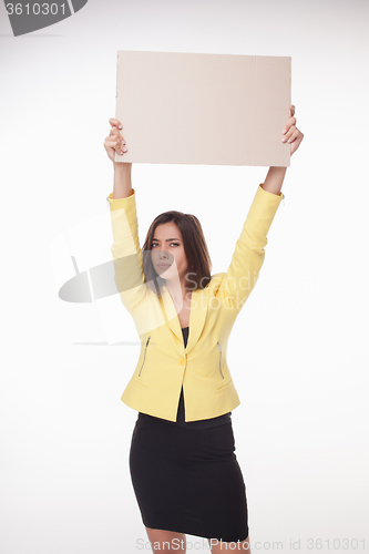 Image of Businesswoman showing board or banner with copy space on white background 