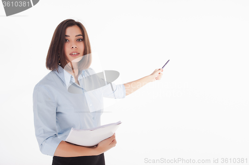 Image of young business woman showing something on the white background