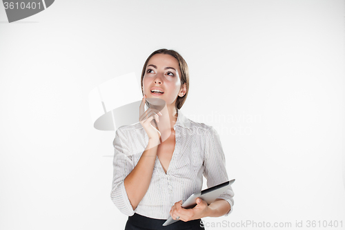 Image of Young business woman with laptop
