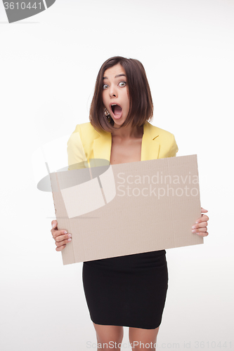 Image of Businesswoman showing board or banner with copy space on white background 