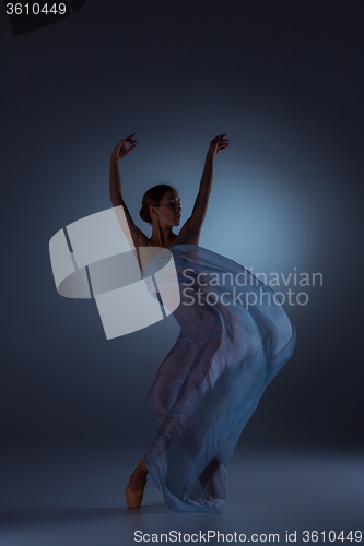 Image of The beautiful ballerina dancing with blue veil