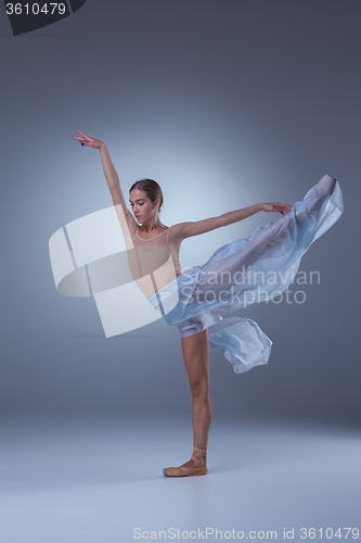 Image of The beautiful ballerina dancing with blue veil