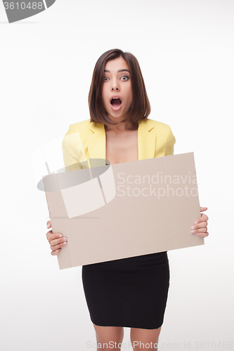Image of Businesswoman showing board or banner with copy space on white background 