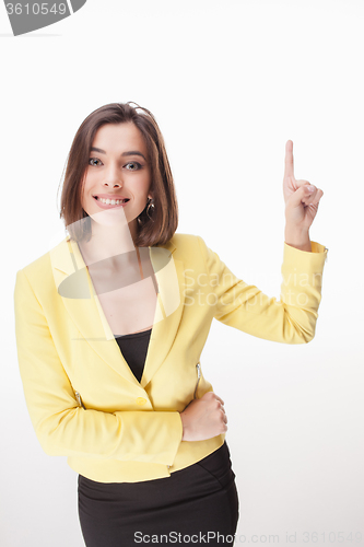 Image of young business woman showing something on the white background