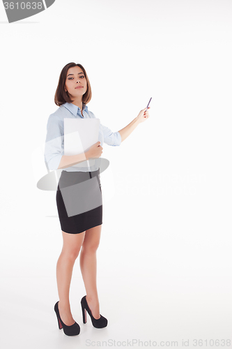 Image of young business woman showing something on the white background