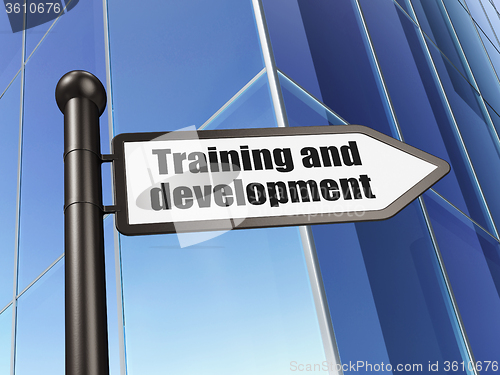 Image of Education concept: sign Training and Development on Building background