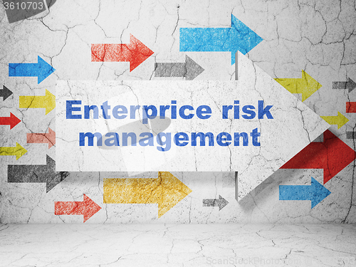 Image of Business concept: arrow with Enterprice Risk Management on grunge wall background