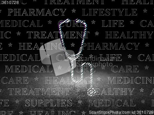 Image of Health concept: Stethoscope in grunge dark room