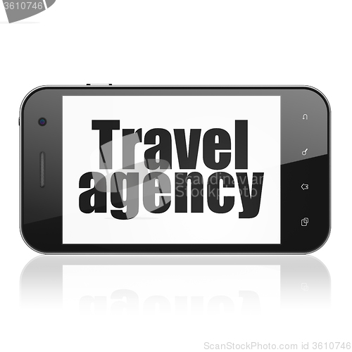 Image of Vacation concept: Smartphone with Travel Agency on display